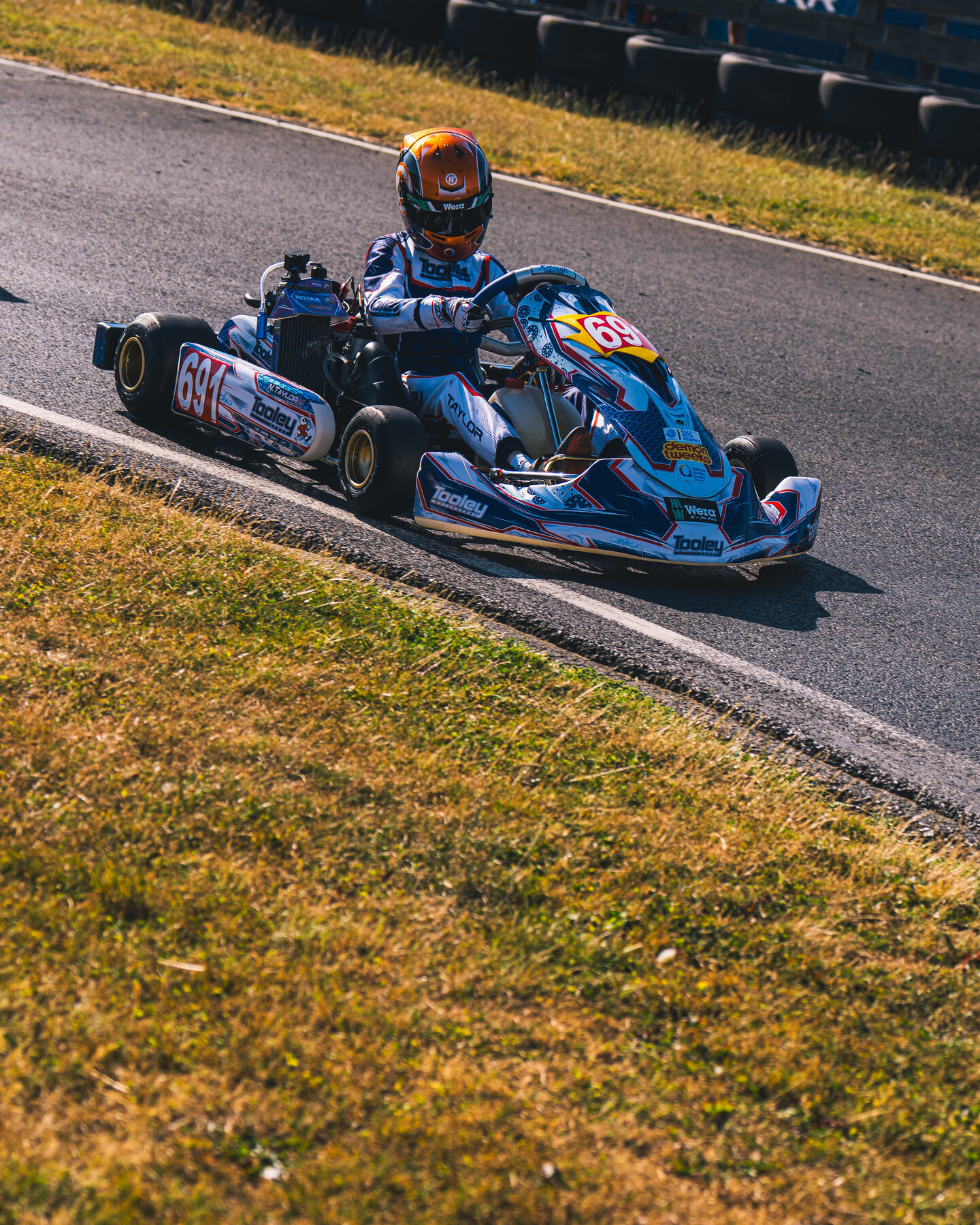 Nelson Taylor racing wheel to wheel in Junior Rotax at Whilton Mill